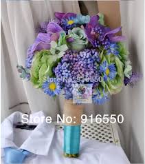 Succulents make for amazing table centerpieces, wedding favors, and bouquets for a purple and green wedding color theme Silk Flower Rose Succulent Vanda Orchid Daisy Green Blue Purple Wedding Bouquet Bridal Bouquet Wedding Floral Arrangement Flower Arrangements Red Roses Arranging Picturesarrange Aliexpress