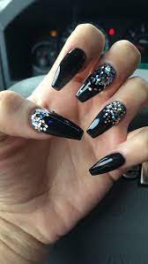 They can go from that board meeting to drinks after work at a new nothing goes better with black than silver. Coffin Nails Black With Glitter Nails Coffin Black Nails With Glitter Acrylic Nail Designs Black Nail Designs
