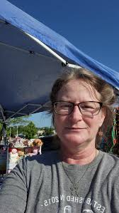 Shirt lady at the farmers market May 13