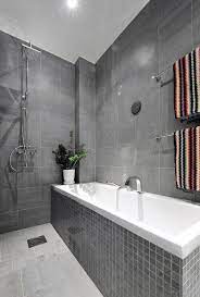 Choose a tile that is a large grey rectangle and then use it throughout the entire. Top 60 Best Grey Bathroom Tile Ideas Neutral Interior Designs