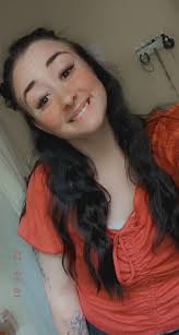 Woman with blueish purple hair at Walmart