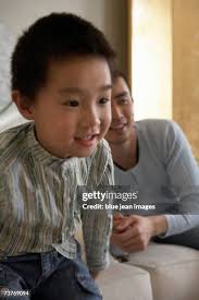 123 Family Hanging On Couch Stock Photos, High-Res Pictures, and Images