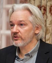 President donald trump signed an act to improve federal background checks for gun purchases. Julian Assange Wikipedia