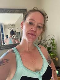 Moments after Christi Rogers tested how the ground feels using her whole  body she was pretty tierd so she tried to take a nap while virginia was  busy laughing with us