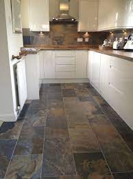 Floor tiles remain a popular option for kitchens because they come in a wide range of colors and materials, making it easy to match the floor with the surrounding walls and cabinets, and offer durability and water resistance. Best 15 Slate Floor Tile Kitchen Ideas Diy Design Decor