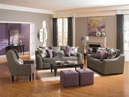 Accent A Room With Radiant Orchid Like We Did Here With Ottomans Pillows And Paint Purple Living Room Purple Living Room Furniture Living Room Grey