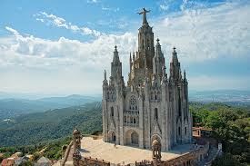 Spanish is one of the most spoken languages in the world and spain is certainly one of the most important, beautiful and influential countries in history as seen in this selection of high. Hd Wallpaper Spain Barcelona Church Sky Trees Hills Architecture Wallpaper Flare