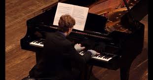 #tbt to 10 (!) years ago, June 2014 at the Cincinnati World Piano  Competition. I drew number 1 and played my first solo round at 9 am, ending  with the Superstar Etude no. 1 by Aaron Jay Kernis — or as ...