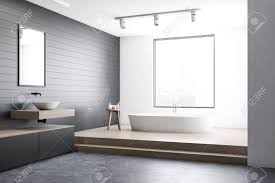 Complete your modern bathroom design by choosing a white interior finish. Corner Of Modern Bathroom With White And Gray Walls Wooden And Stock Photo Picture And Royalty Free Image Image 129261440
