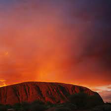 This event often results in a major reddening of the rock a minute before sunset. Sunrise And Sunset At Uluru Uluru Ayers Rock Australia
