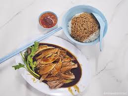 Add yam and mix evenly. The Dead Cockroach South Buona Vista Braised Duck Rice Relocated 81 Desker Road