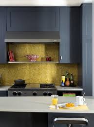 The stylish light gray center kitchen island is partnered by three tolix bar stools and stylish pendant lights. 25 Lively And Bold Grey And Yellow Kitchens Shelterness