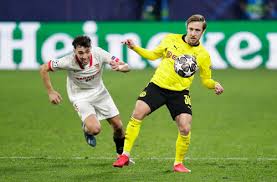 На первый взгляд пара «севильи» и «боруссии» дортмунд смотрелась одной из самых невзрачных на стадии 1/8 финала лиги чемпионов. X8xz Qevv07rwm