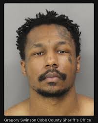 Two Inmates Accused of Attacking Another Inmate…Gregory Swinson, 26, and  Jonathan Leon Briscoe, 21, both inmates at the Cobb County Adult Detention  Center, are accused of making a coordinated attack