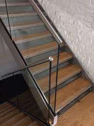 Frameless Glass Balustrade With Stainless Steel Slotted Channel Tube Top Rail On New Steel Staircase Design Modern Frameless Glass Balustrade Glass Balustrade