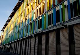 Modern parking garage for car at daytime; 11 Stunning Parking Garage Designs With A Contemporary Flair