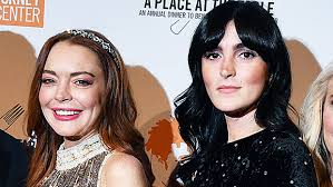 This lindsay lohan photo contains fur coat, fur collar, fur accent, mink, mink coat, and sable coat. Lindsay Lohan Posts Selfie With Sister Ali On Twitter See Pretty Pic Hollywood Life