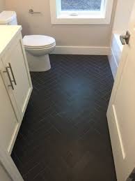 Matte Black Herringbone Tile For The Bathroom Floor Modern Design In 2020 Black Bathroom Floor Black Tile Bathrooms Black Floor Tiles