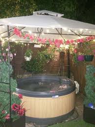 You can find many hot tub enclosures for winter needs, but you should look at a few points when finding one 30 Awesome Hot Tub Enclosure Ideas For Your Backyard Hot Tub Backyard Hot Tub Garden Hot Tub Landscaping