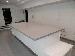 Midcentury modern kitchen featuring fieldstone countertops. Gray Concrete Kitchen Island Countertop