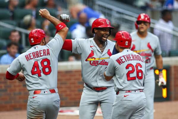Cardinals score 7 runs in 7th inning for 11-5 comeback win over Braves and  series win | AP News