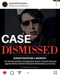 At work, sporting Manson