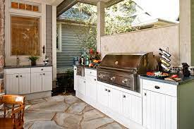 Best to choose an exterior timber such as teak that will be able to withstand rot. Outdoor Kitchen Cabinets Landscaping Network