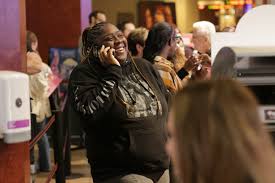 Swifties swiftly fill theaters to see Taylor Swift's “Eras” concert film