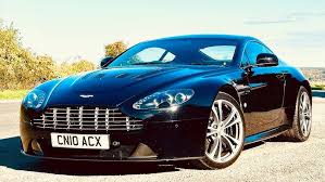 Image result for Amethyst Red 2011 Aston Martin