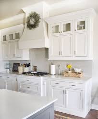 White Kitchen With Glass Inserts In Upper Cabinets Kitchen Cabinets Decor White Kitchen Design Kitchen Renovation