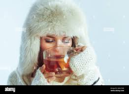 Cup hot tea honey winter hi-res stock photography and images