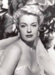 Mary Beth Hughes, seen in The Lady Confesses (1945)