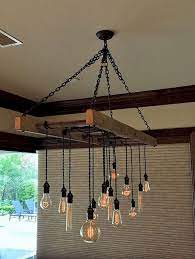 18 The Top Farmhouse Ladder Chandelier Design Ideas Ladder Chandelier Chandelier Design Cool Chandeliers