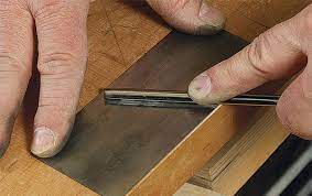 So i marked out the rectangle and traced the goose neck scraper i had on hand. The Right Way To Sharpen A Card Scraper Finewoodworking
