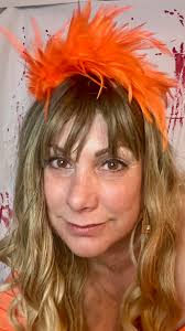 Hi all! I just wanted to introduce myself and share a photo. I went as TS  Life of a Showgirl this year for Halloween! 🧡🩵🧡