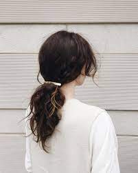 Low Ponytail With A Gold Hair Clip Coveteur Hair Styles Medium Hair Styles Messy Hairstyles