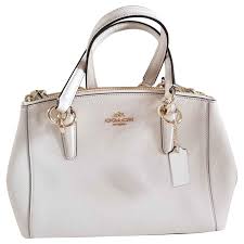 Sac à main coach en cuir de vachette grainé coloris noir, doublure coton coloris noir sigle de la marque, empiècements métal doré. Coach Sac A Main Ou Bandouliere Cuir Blanc Blanc Casse Ref 126127 Joli Closet