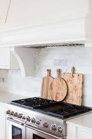 Check spelling or type a new query. Cutting Board Behind Stove Design Ideas
