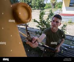 U.S. Marine Lance Cpl. Justus Q. Scichowski with Task Force Koa Moana,  helps paint Metinaro Primary School during Exercise Crocodilo 16-1,  Metinaro, Timor-Leste, June 8, 2016. This exercise is part of Task