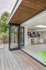 Bi Fold Doors Inside Outside Level Threshold Timber Decking Timber Clad Roof Overhang Open Plan Con House Exterior Flat Roof Design Flat Roof House
