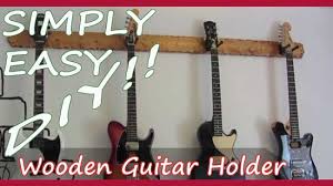 This was made out of leftover pallet. Simply Easy Diy Diy Wooden Guitar Hanger