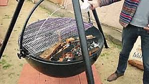 Vintage outdoor garden extra large cauldron fire pit made in cast iron indian fire bowl. This Hanging Tripod Cauldron Might Be The Manliest Way To Bbq Or Have A Bonfire