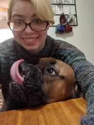 Cute dog receives affection and love