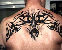 Tribal tattoos have a very distinct style and are a popular choice for both men and women. Shoulder Cap Fan Tattoo Patterns Upper Back Tribal Tattoo Designs For Men Tribal Back Tattoos Back Tattoos For Guys Tribal Tattoos For Men