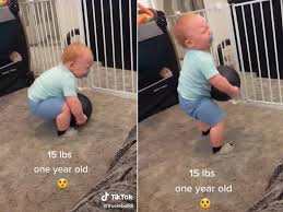 Super Strong 1 Year Old Picks Up 15lb Ball And Stuns The Internet Indy100