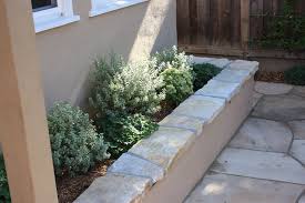 Stucco Seating Wall With South Bay Quartzite Cap Concrete Patio Designs Garden Wall Mediterranean Garden Design