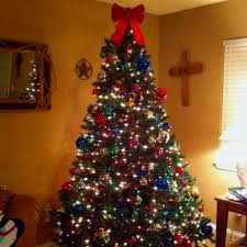 Christmas Tree Gift Multi Colored Lights And Balls Of All Sizes Also Present Ornaments Tinsel Christmas Tree Christmas Vignettes Retro Christmas Decorations