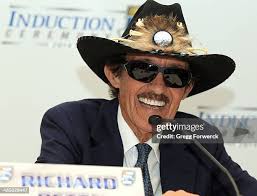 Former NASCAR driver Harry Gant helps induct Jack Inman into the... News  Photo