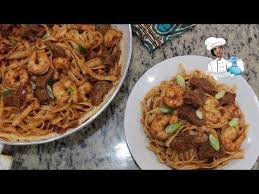 Jollof Pates Tagliatelles Aux Crevettes Et Boeuf Recette Africaine Tagliatelle Crevette Tagliatelles Recettes De Cuisine Africaine