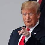 Global investors rattled all-out trade